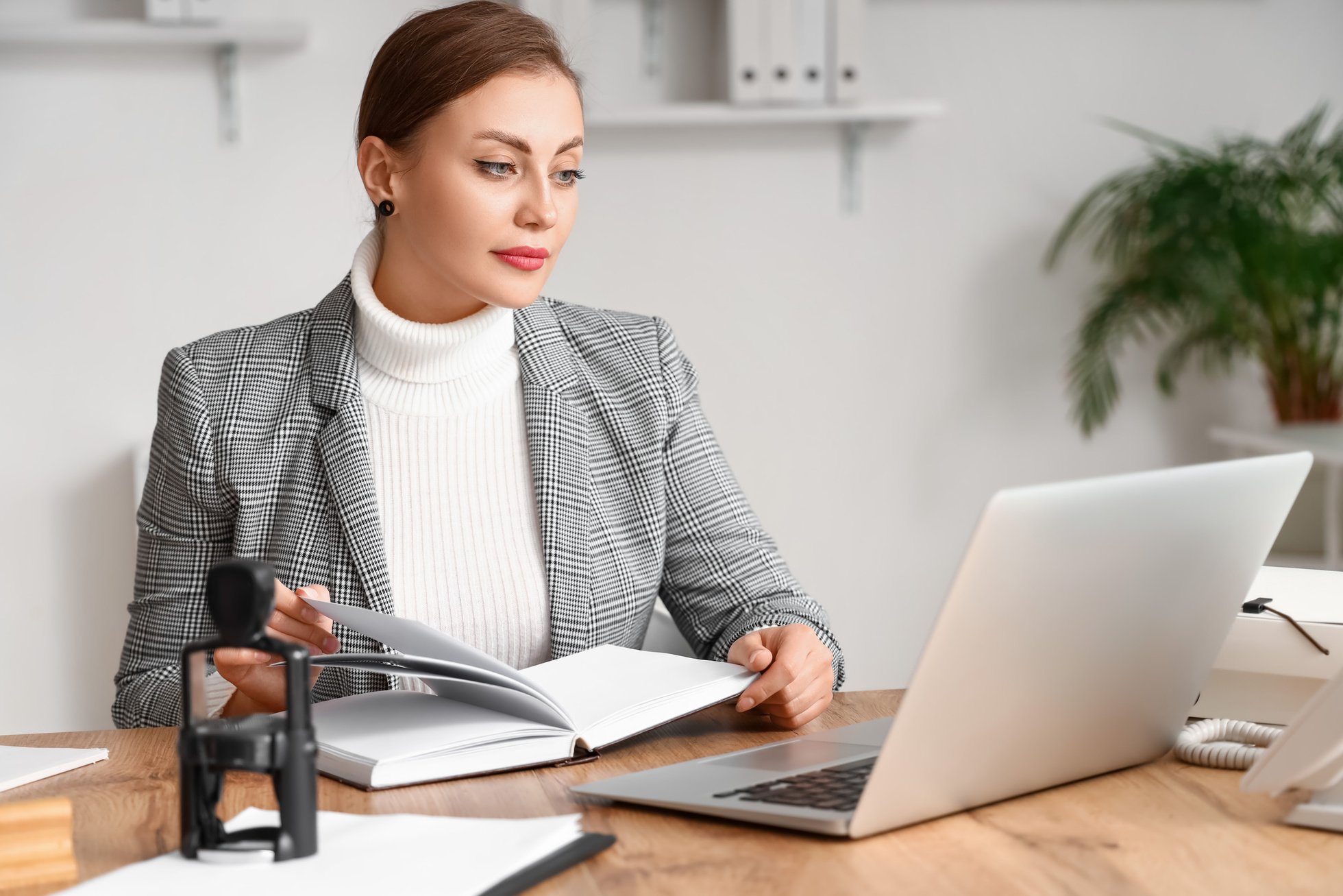 Female Notary Public Working in Office