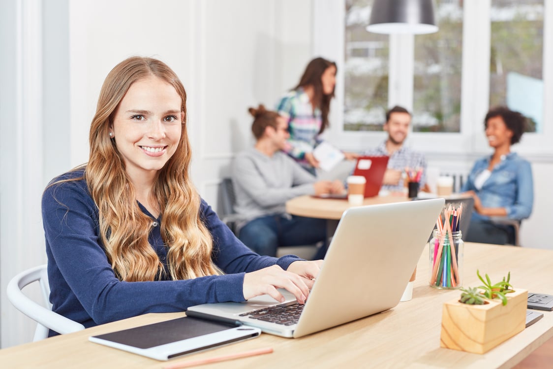 Young Woman as Trainee Is Working on Laptop PC